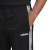 spodnie adidas Essentials 3 Stripes Tapered Tric DQ3090